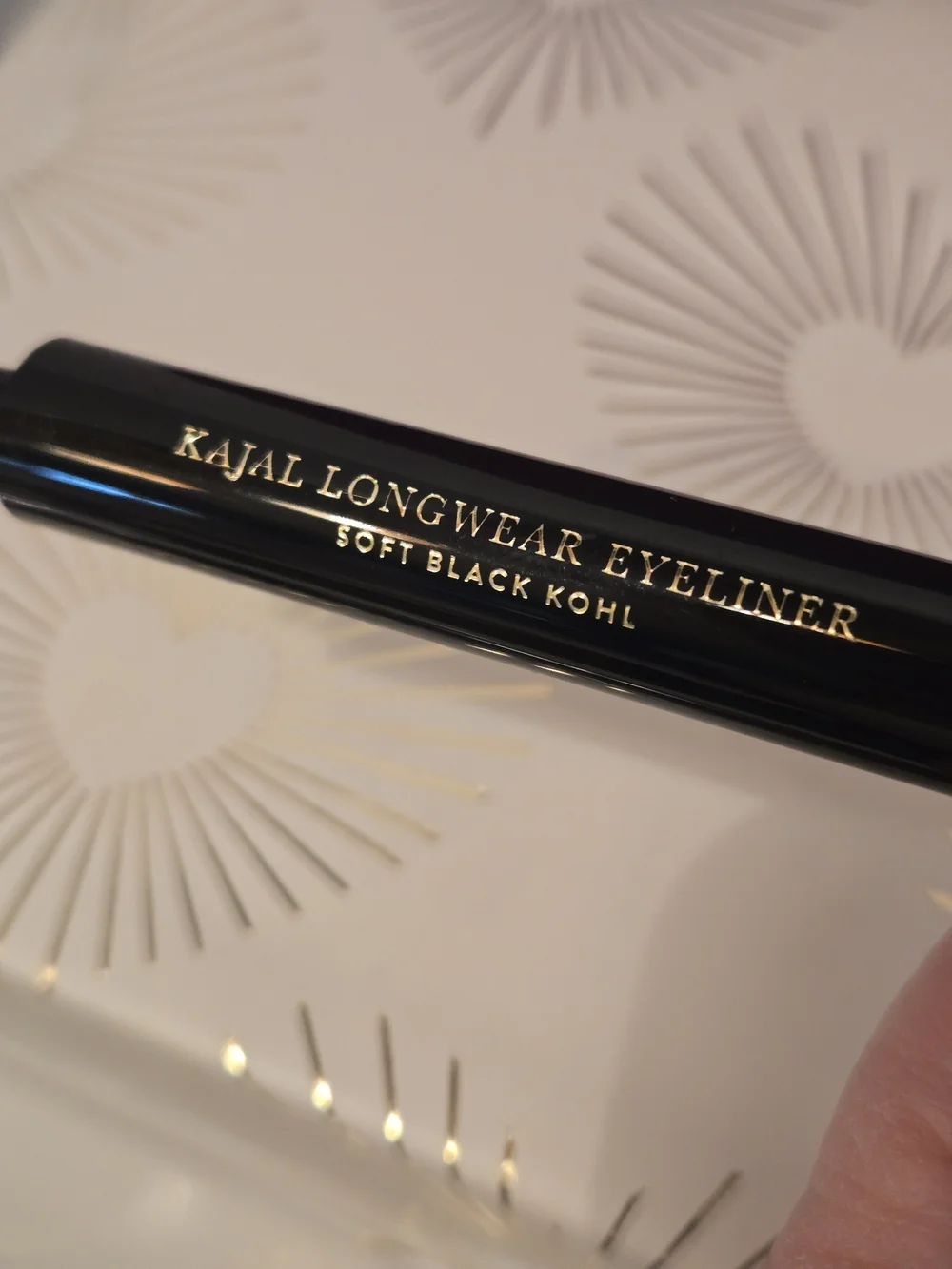 Laura Geller Makeup Bundle With Wine Quilted Cosmetic Pouch.